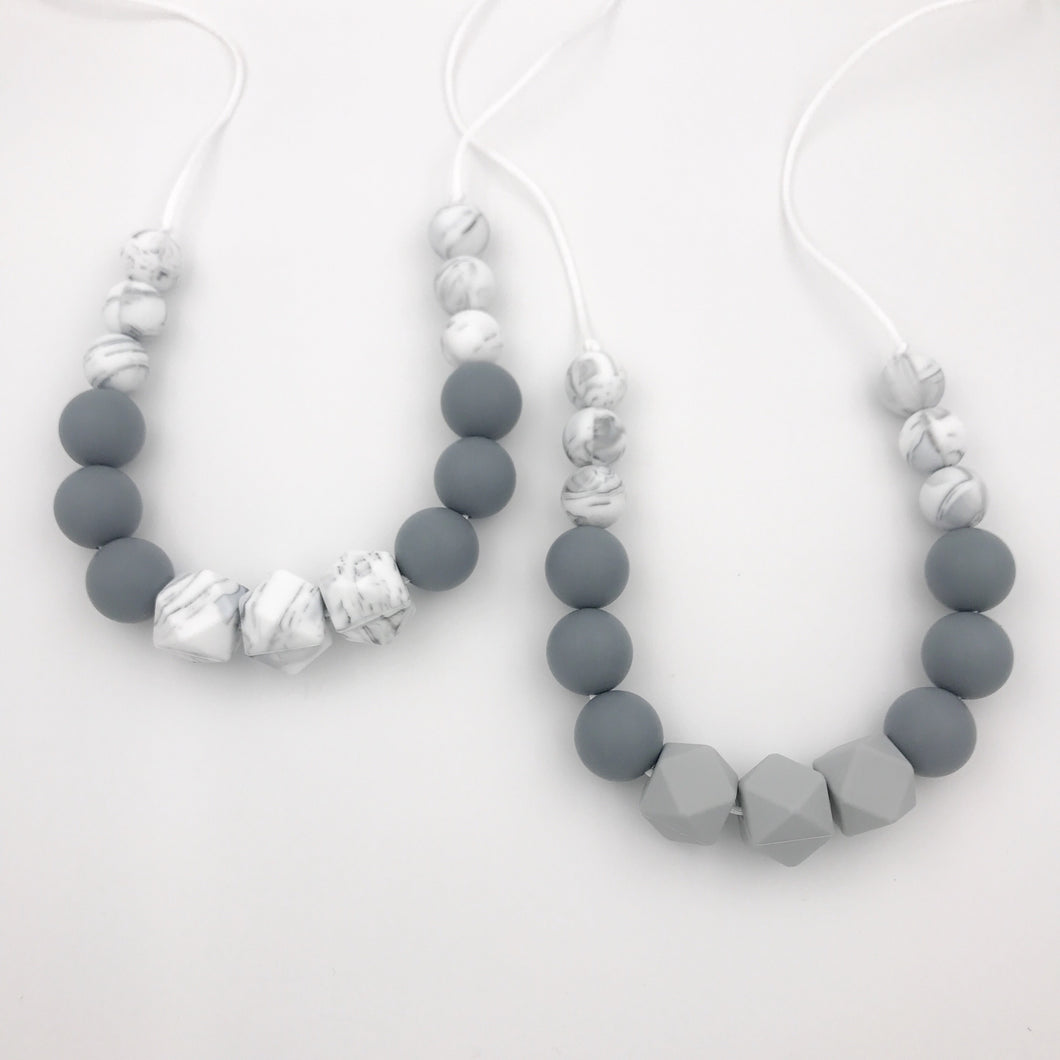 monochrome silicone teething necklaces